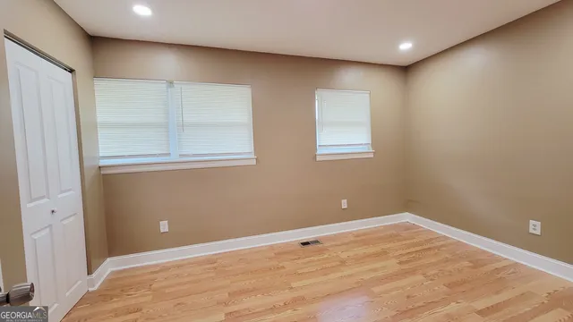 an empty room with windows