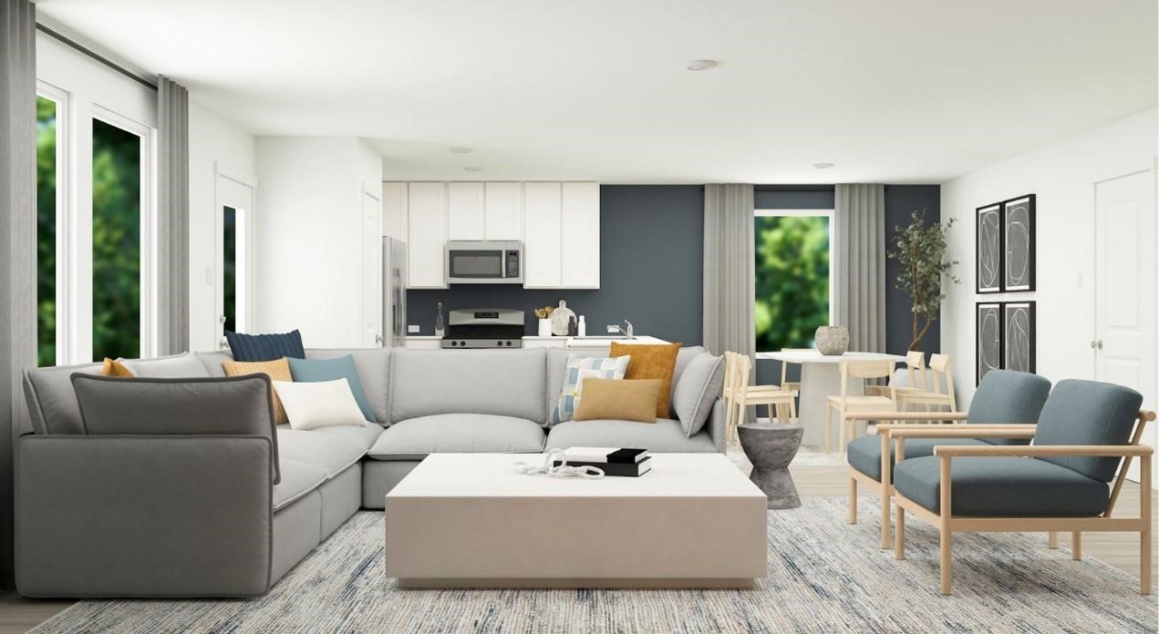 9018 Song Sparrow Way Baytown, TX 77521 - Photo 19 of 21 a living room with furniture a large window and a wooden floor