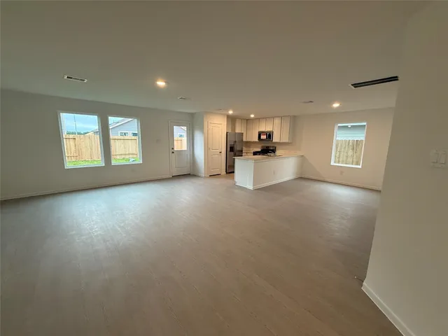 an empty room with windows