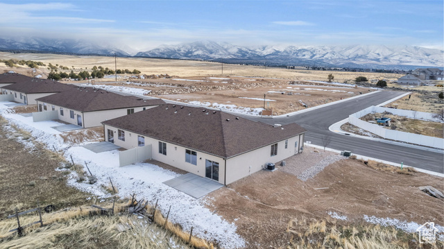 155 East 360th Street East, Unit 10B Fillmore, UT 84631 - Photo 42 of 43 Snowy aerial view featuring a mountain view
