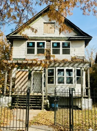 a front view of a house with a balcony
