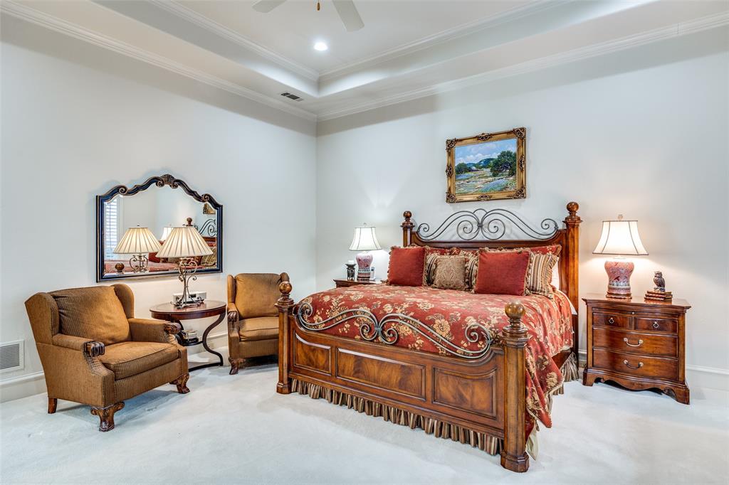5620 Shubert Court Dallas, TX 75252 - Photo 21 of 32 a bedroom with bed and a couch
