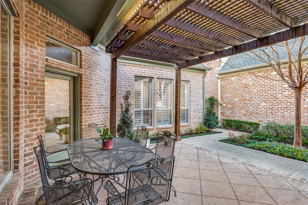 5620 Shubert Court Dallas, TX 75252 - Photo 25 of 32 a house view with a seating space and garden view