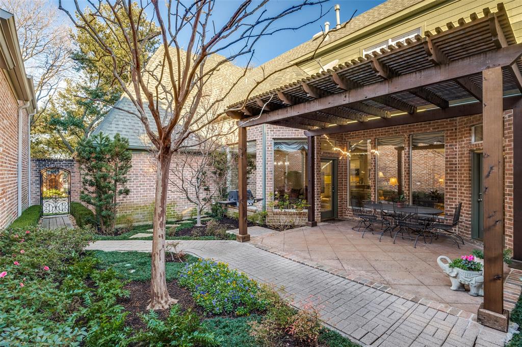 5620 Shubert Court Dallas, TX 75252 - Photo 28 of 32 a view of a building with sitting area