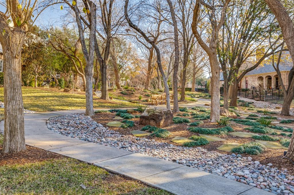 5620 Shubert Court Dallas, TX 75252 - Photo 30 of 32 a view of yard with tree in the background