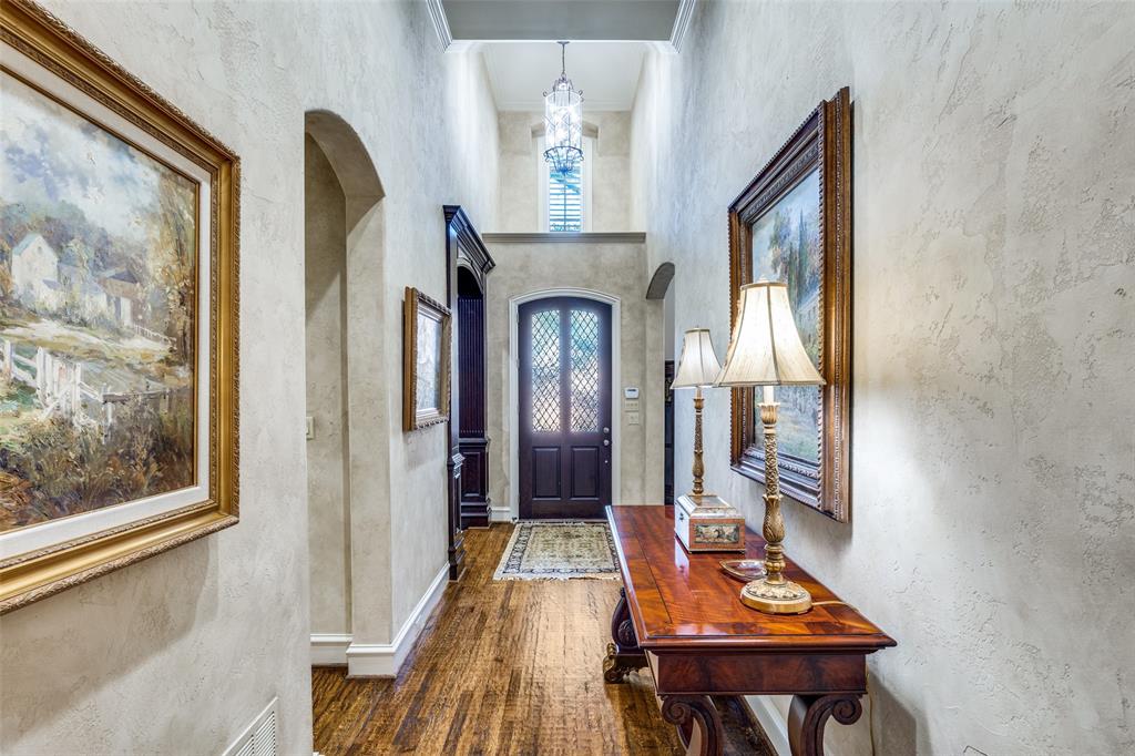 5620 Shubert Court Dallas, TX 75252 - Photo 3 of 32 a view of an entryway with a chandelier
