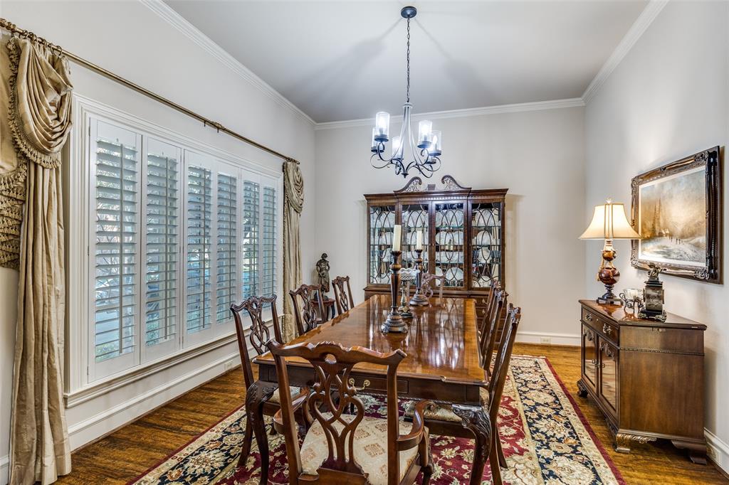 5620 Shubert Court Dallas, TX 75252 - Photo 4 of 32 a view of a dining room with furniture window and wooden floor