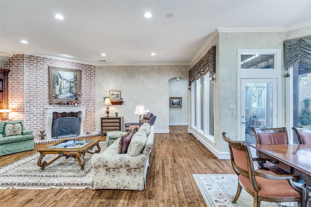 5620 Shubert Court Dallas, TX 75252 - Photo 6 of 32 a living room with furniture and a rug