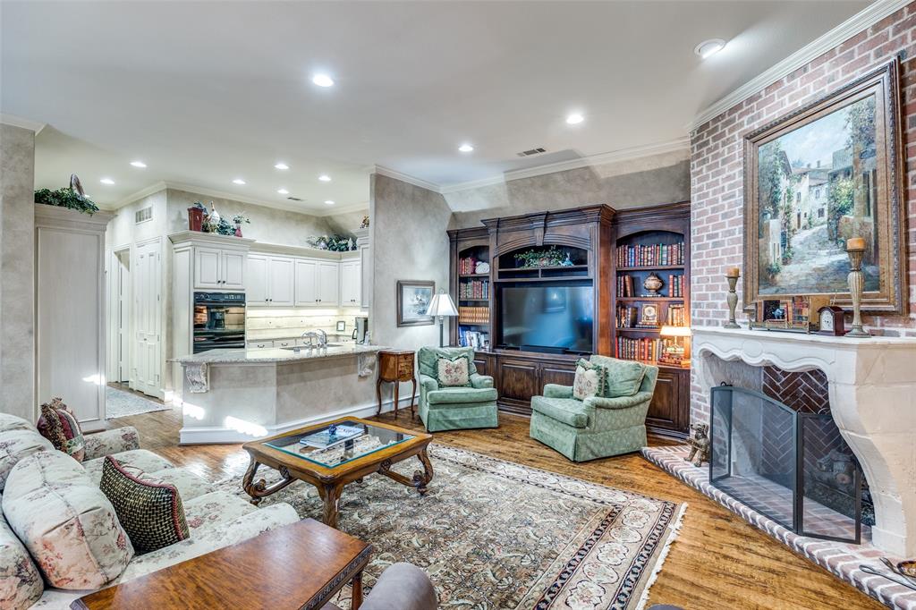 5620 Shubert Court Dallas, TX 75252 - Photo 7 of 32 a living room with furniture and a open kitchen view