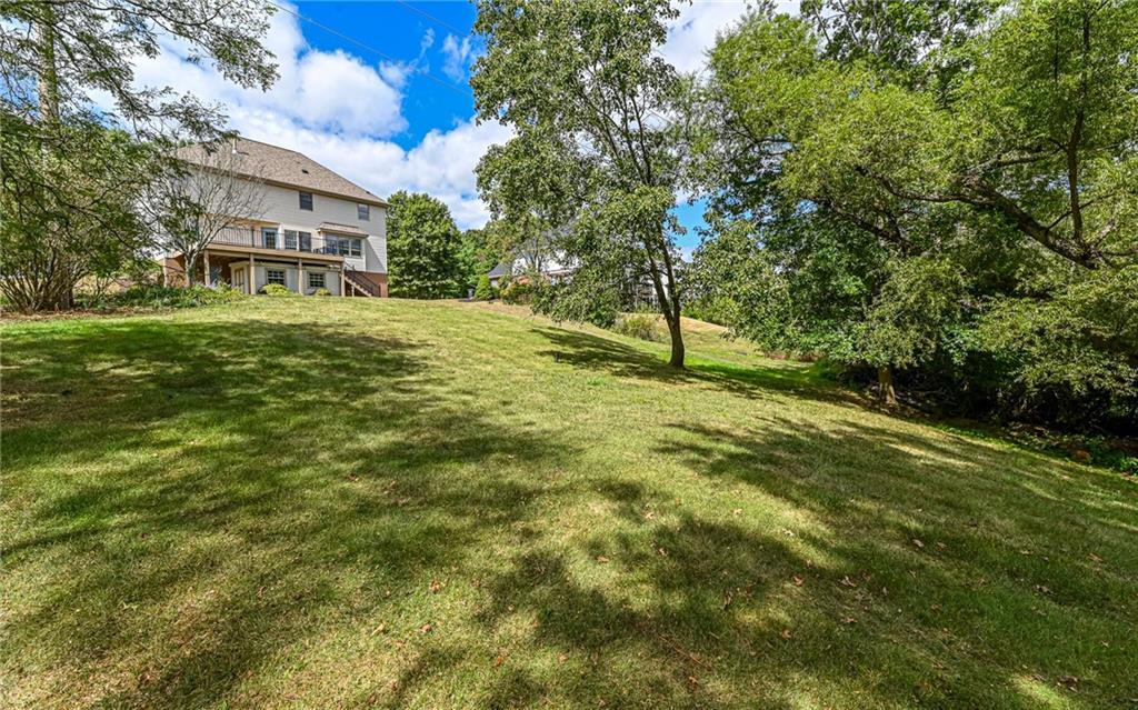 124 Fox Meadow Drive Wexford, PA 15090 - Photo 36 of 37 a view of a big house with a big yard and large trees