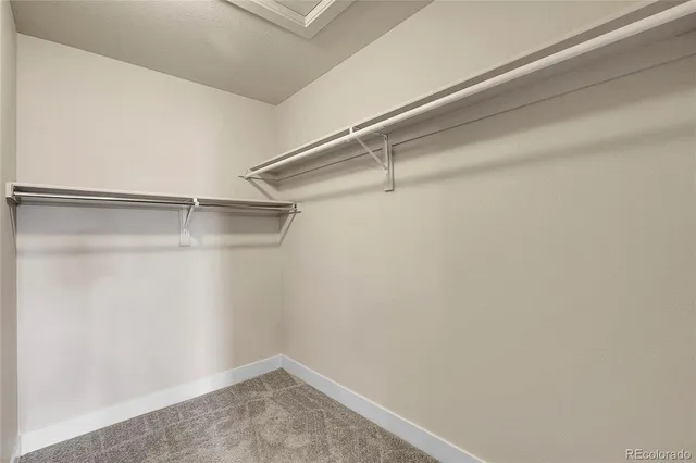 a bathroom with a sink toilet a mirror and shower