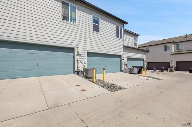 a view of a house with large windows