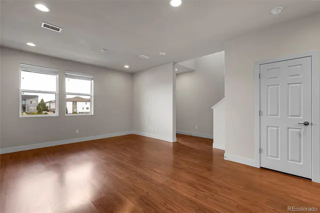 a kitchen with a stove microwave and sink