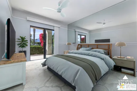a bathroom with a double vanity sink mirror and shower