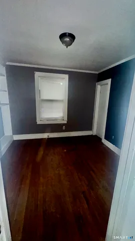 a kitchen with a table and chairs in it