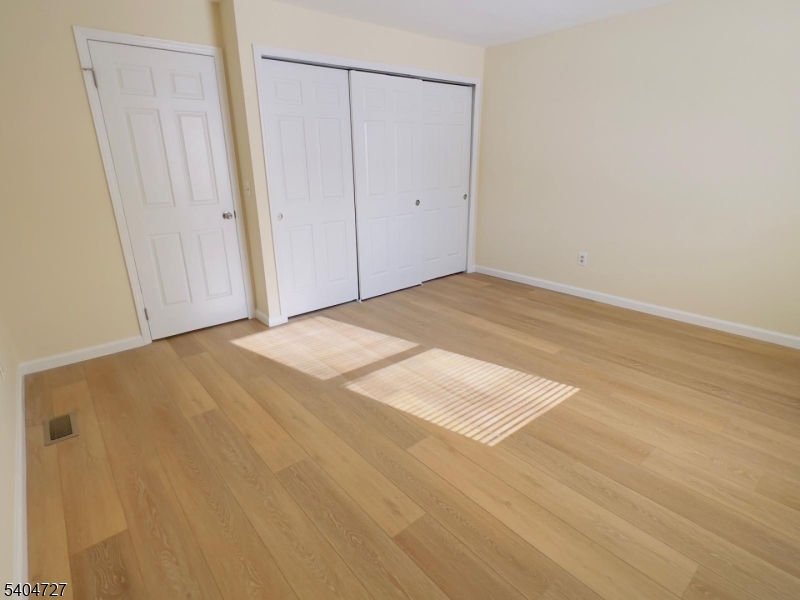 27 Alexandria Way, Unit 27 Bernards, NJ 07920 - Photo 12 of 19 a view of an empty room