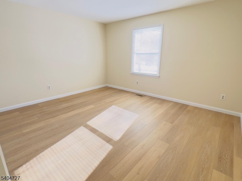 27 Alexandria Way, Unit 27 Bernards, NJ 07920 - Photo 15 of 19 an empty room with a window