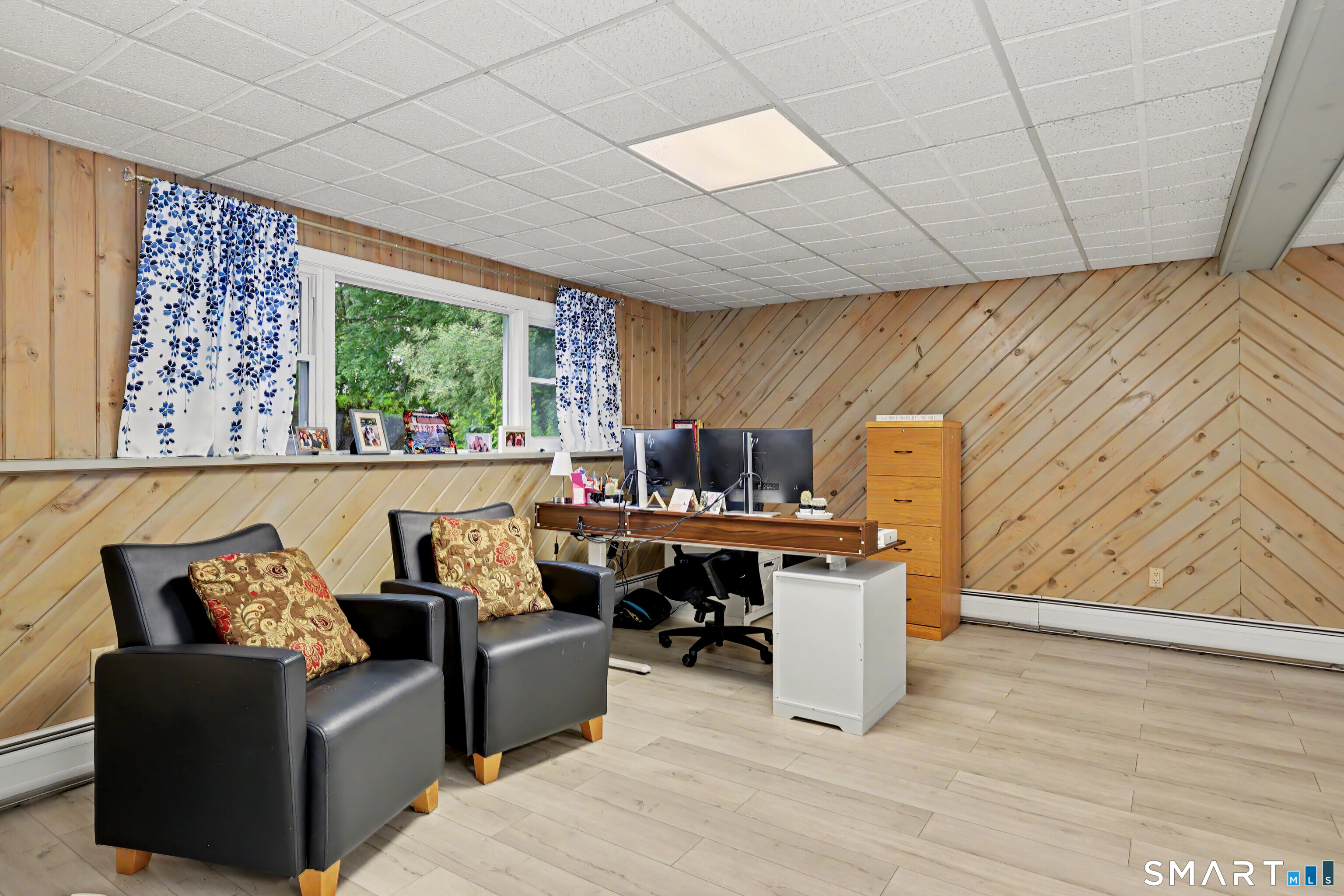 44 Haverhill Road Trumbull, CT 06611 - Photo 23 of 32 a work room with furniture and a window