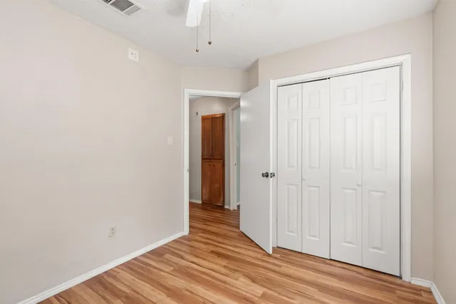 a view of a livingroom with wooden floor