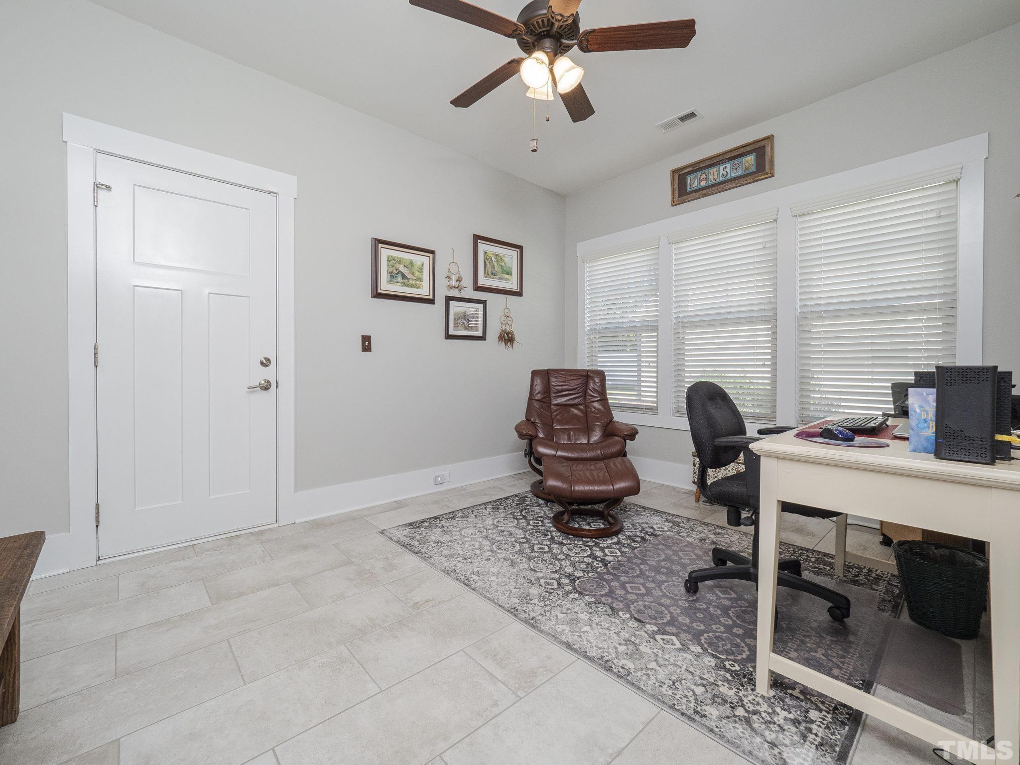 137 Bella Square Smithfield, NC 27577 - Photo 15 of 29 a livingroom with furniture and window
