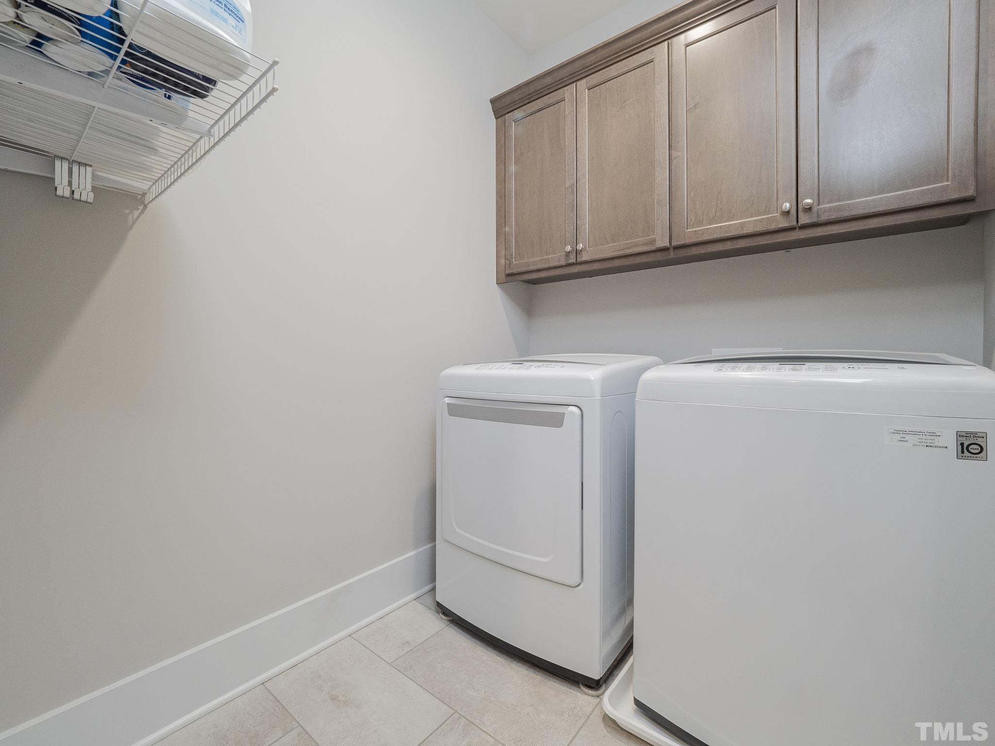 137 Bella Square Smithfield, NC 27577 - Photo 18 of 29 a utility room with dryer and washer