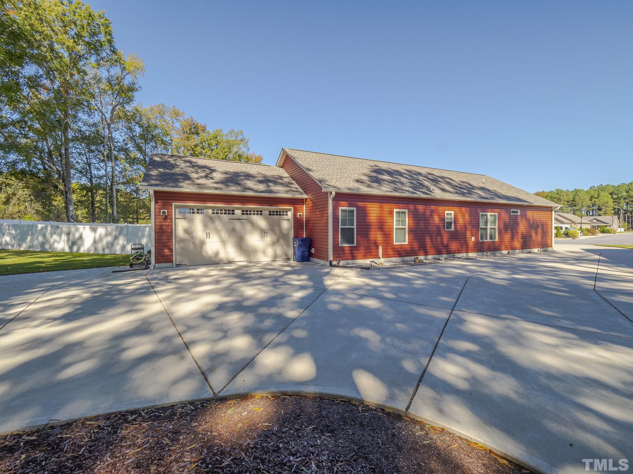 137 Bella Square Smithfield, NC 27577 - Photo 19 of 29 a front view of a house with a yard