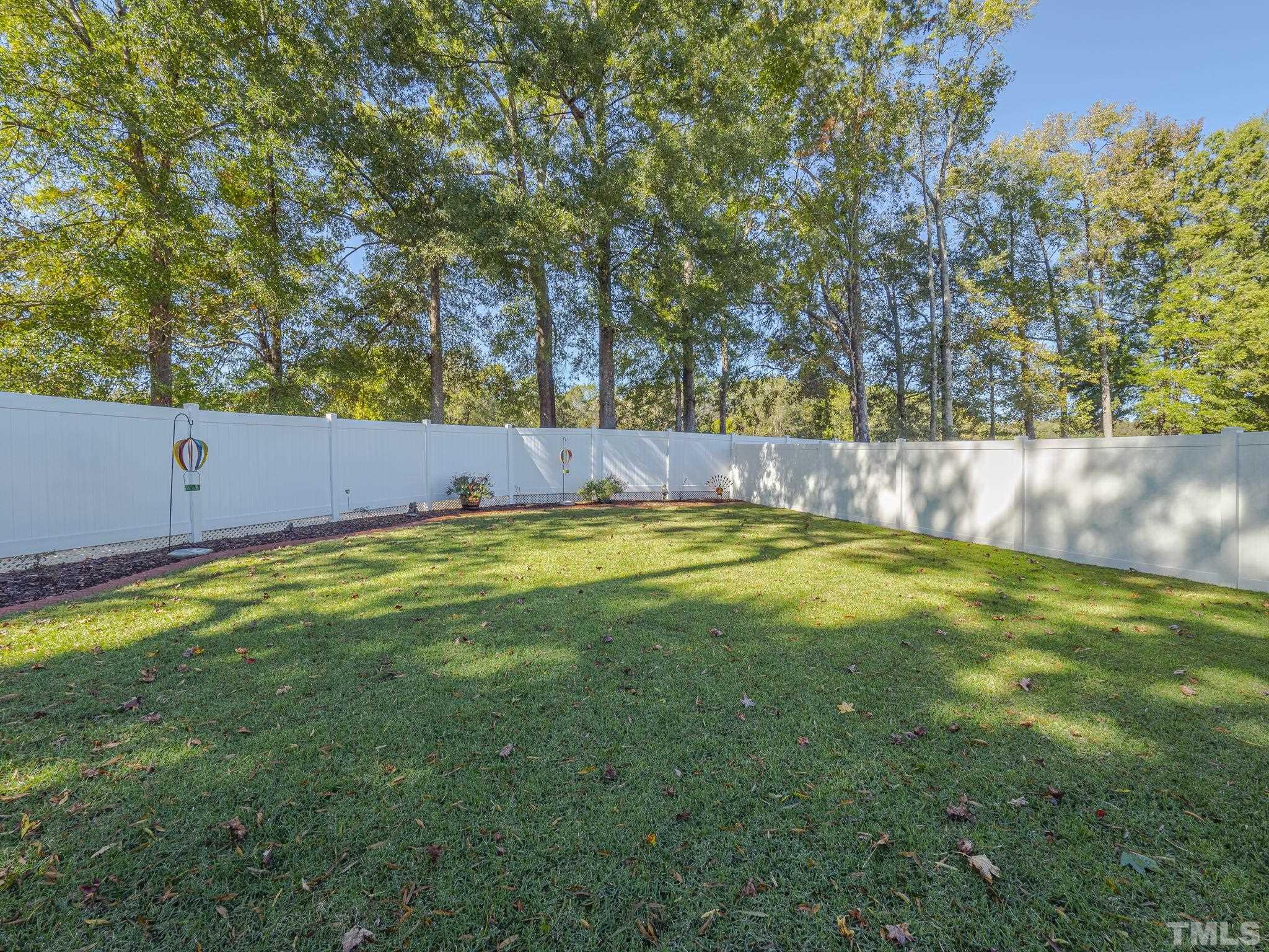 137 Bella Square Smithfield, NC 27577 - Photo 23 of 29 a view of yard with trees