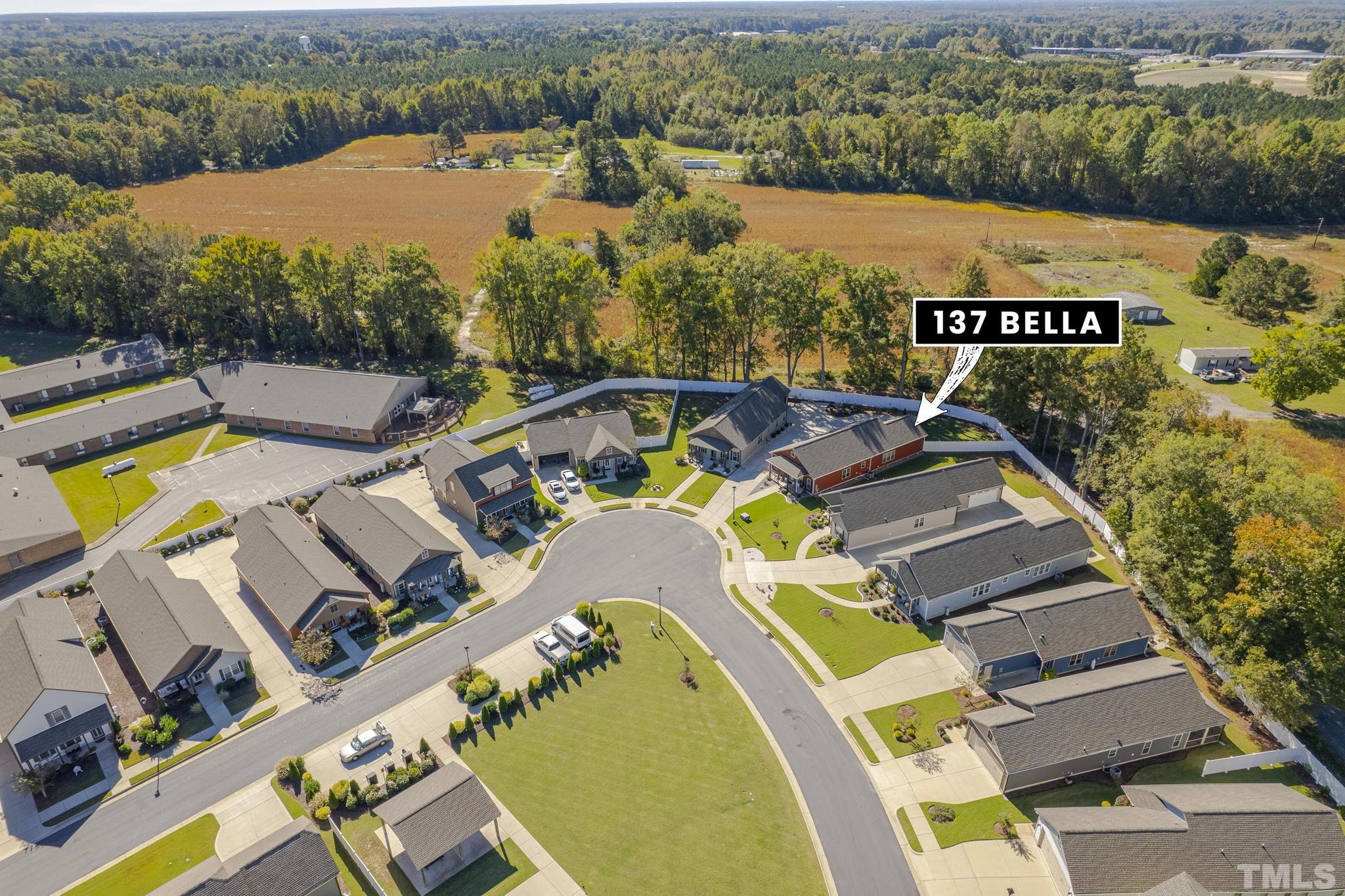 137 Bella Square Smithfield, NC 27577 - Photo 25 of 29 an aerial view of a house with a swimming pool