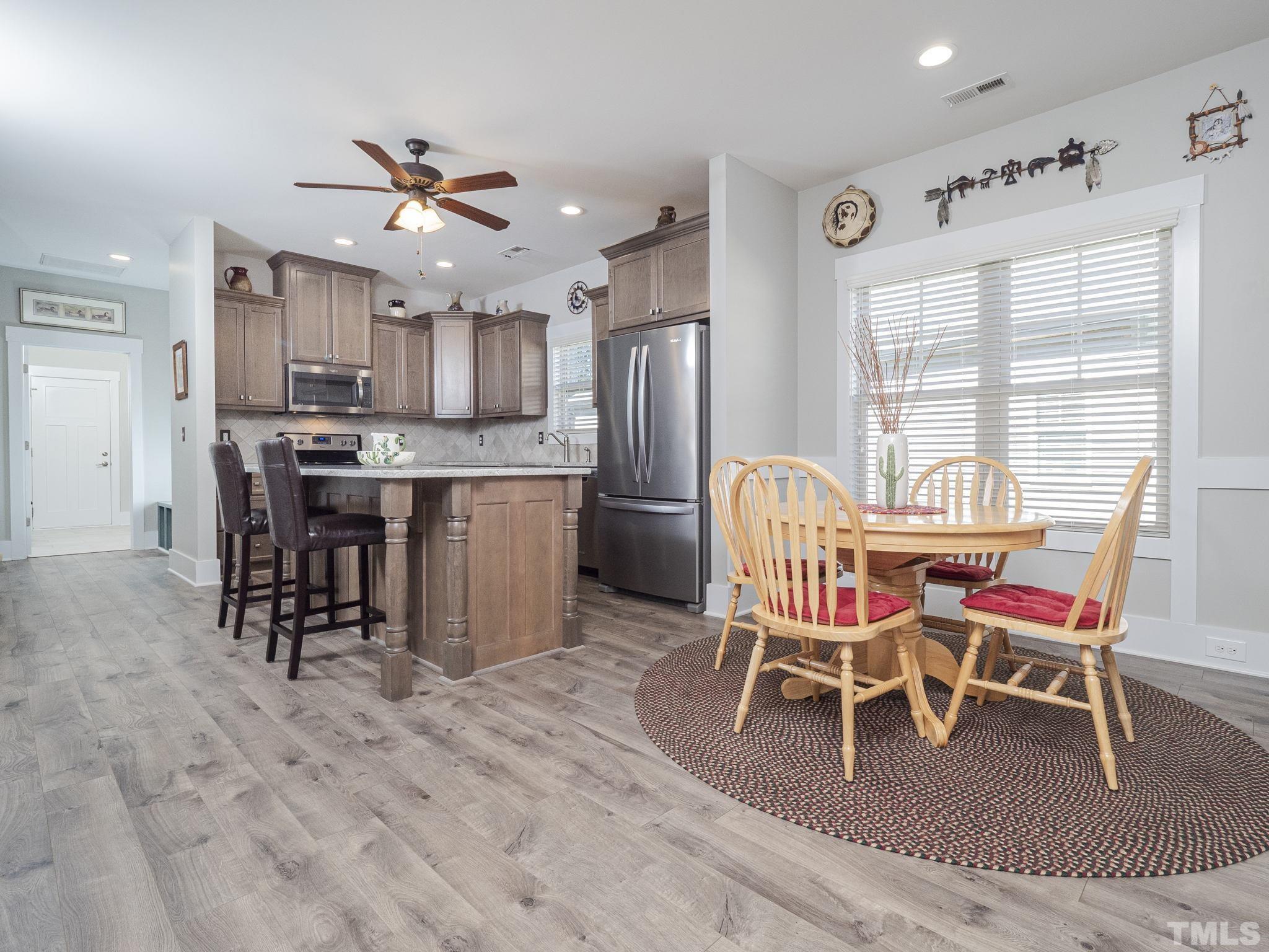 137 Bella Square Smithfield, NC 27577 - Photo 7 of 29 a dining room with furniture and window