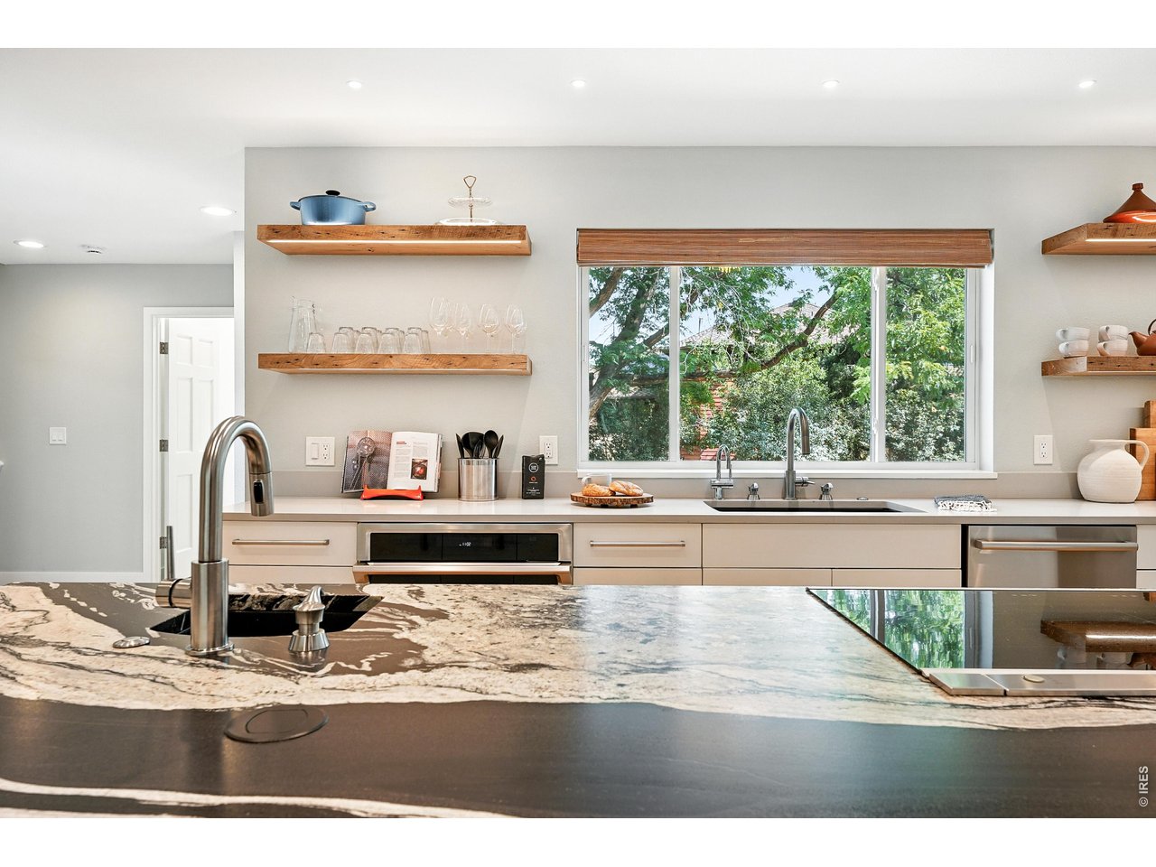 4557 Apple Way Boulder, CO 80301 - Photo 10 of 42 Premium countertops, appliances, and generous prep space make everyday meals feel elevated.