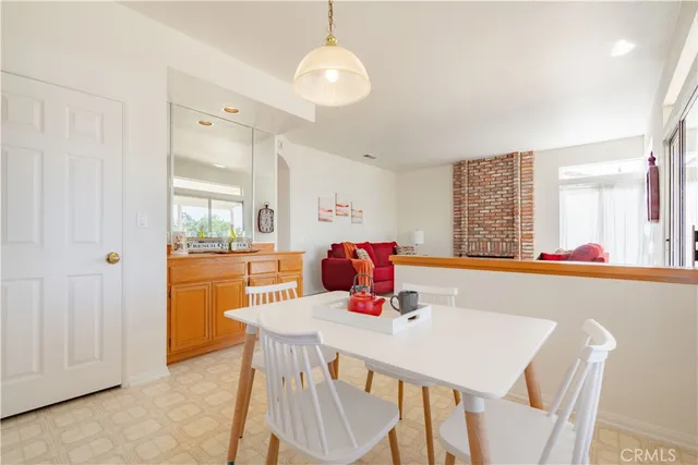 a view of a hallway with stairs