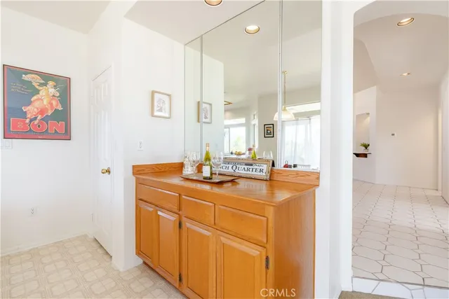 a spacious bedroom with a bed and a couch