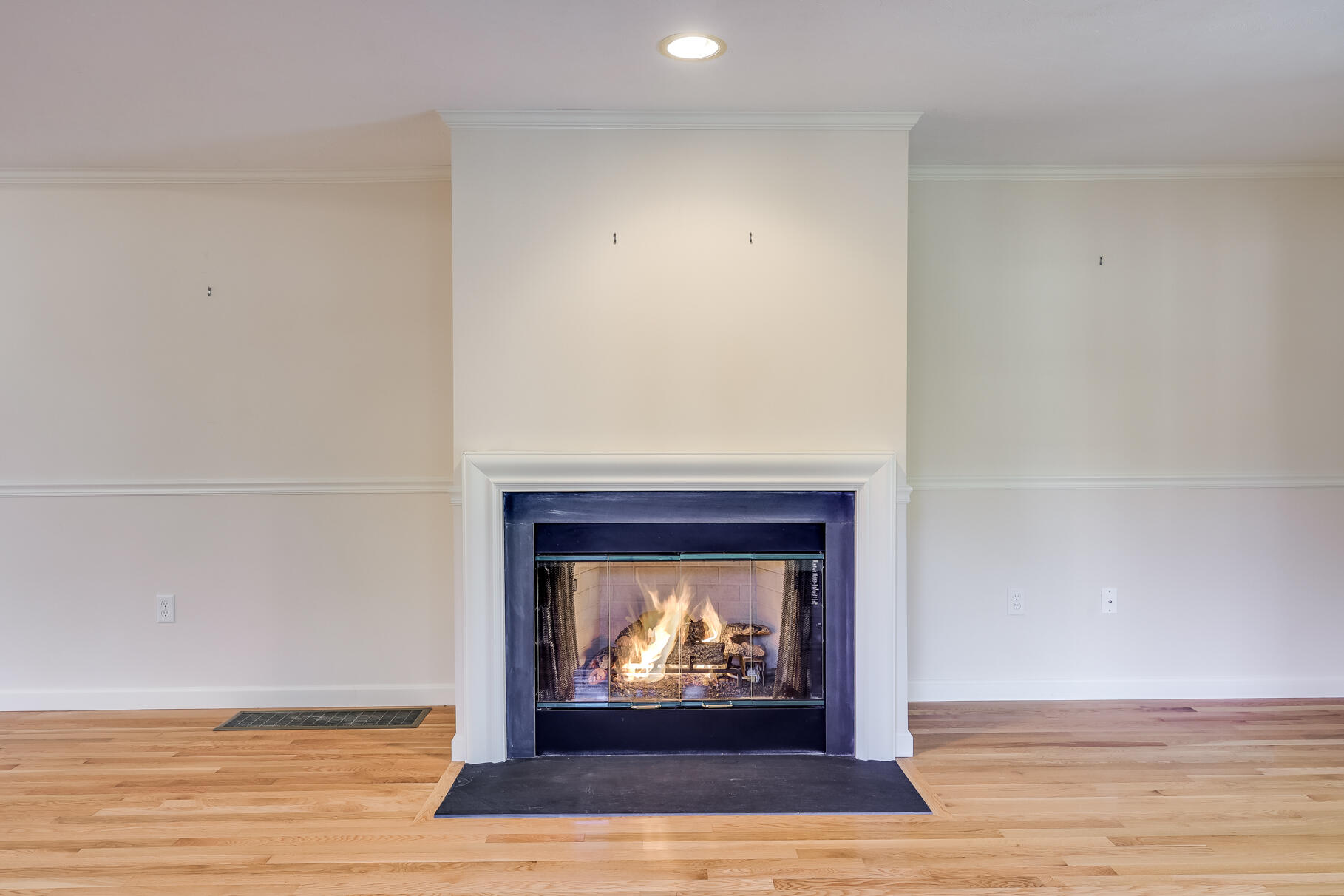 16 North Ridge Road Mashpee, MA 02649 - Photo 18 of 47 a view of fireplace with wooden floor