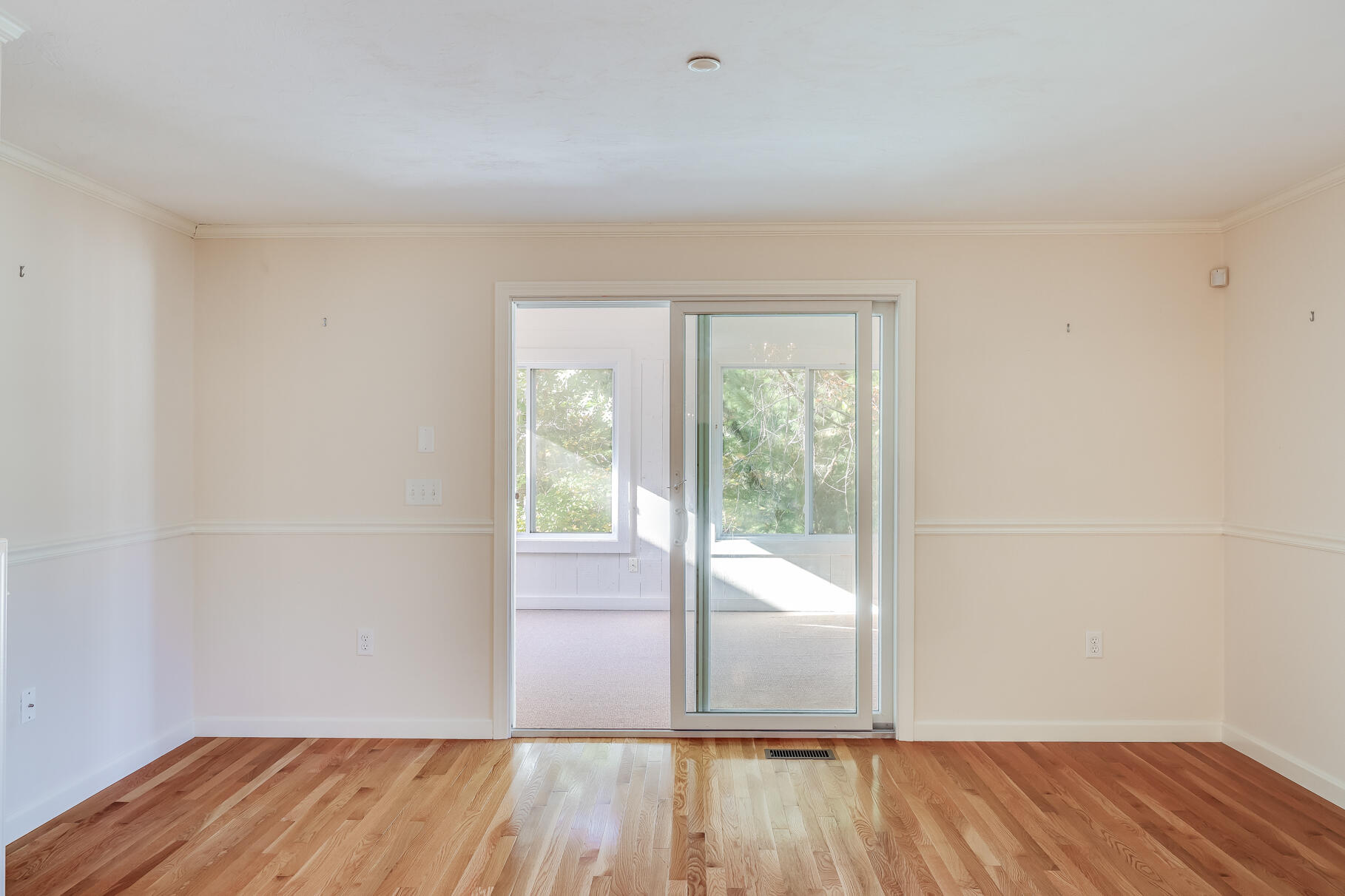 16 North Ridge Road Mashpee, MA 02649 - Photo 21 of 47 wooden floor in an empty room with a window