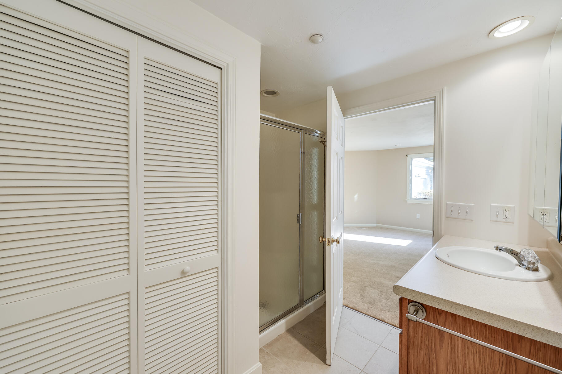 16 North Ridge Road Mashpee, MA 02649 - Photo 29 of 47 a bathroom with a sink and a mirror