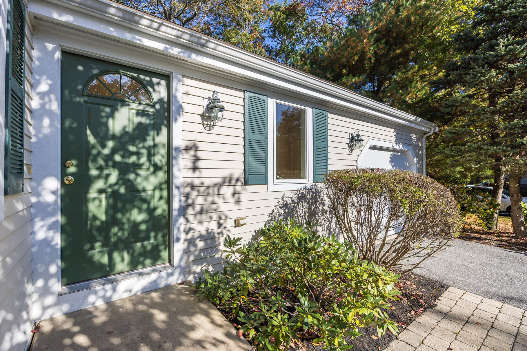 16 North Ridge Road Mashpee, MA 02649 - Photo 3 of 47 a front view of a house with garden