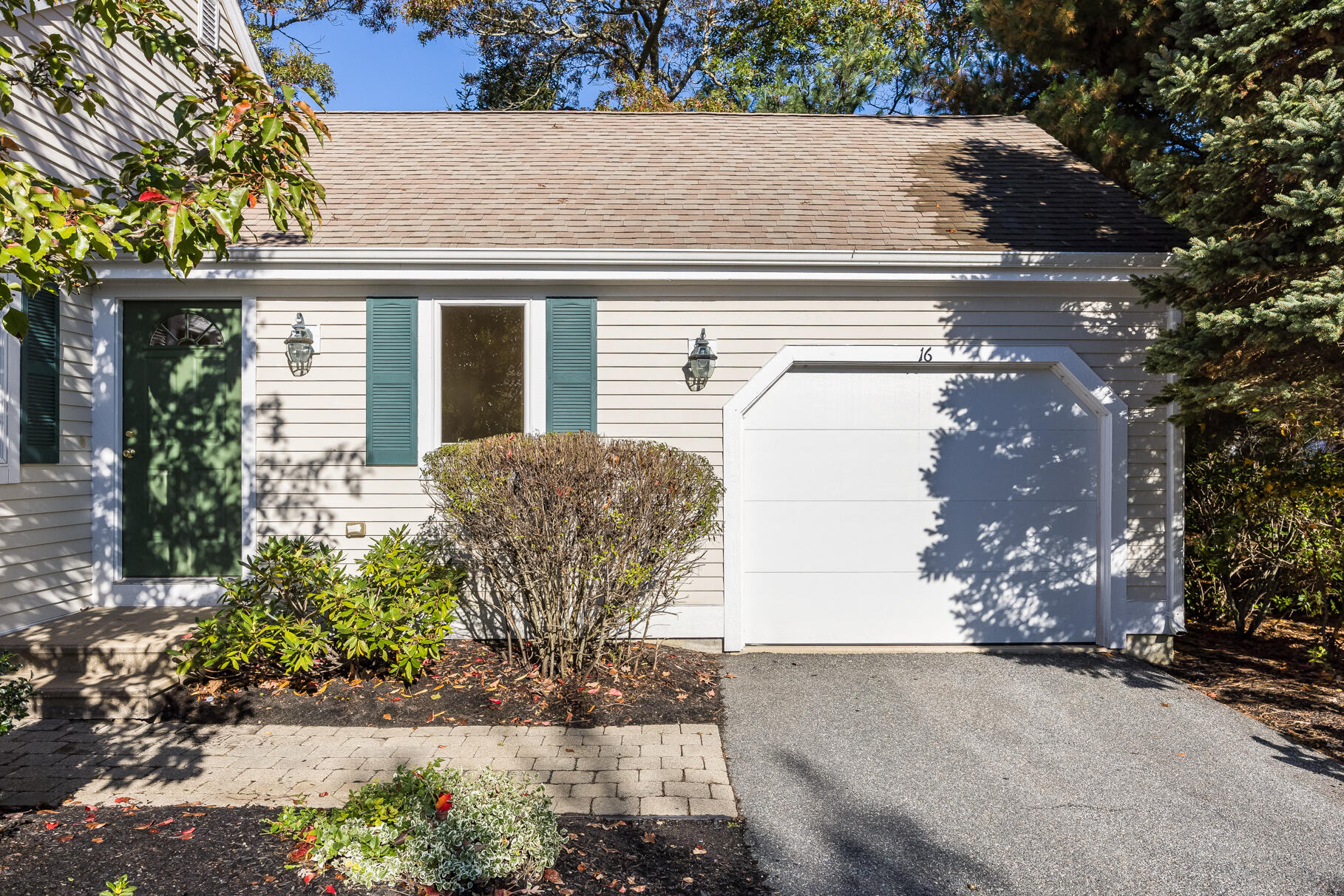 16 North Ridge Road Mashpee, MA 02649 - Photo 5 of 47 a front view of a house with garden