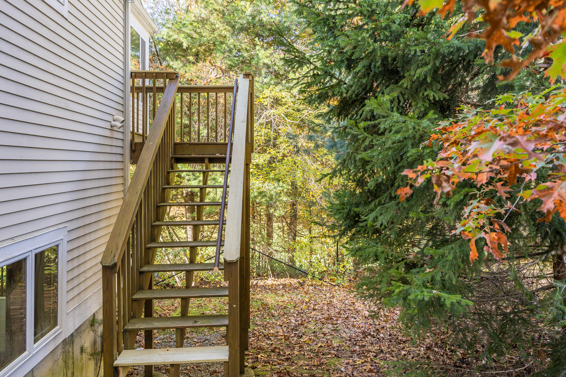 16 North Ridge Road Mashpee, MA 02649 - Photo 7 of 47 a view of a large window with plants in front of door