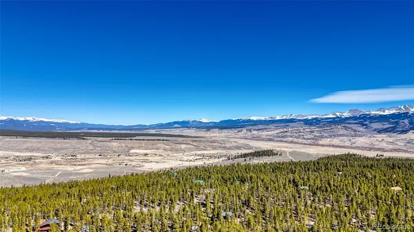 a view of mountains and valleys