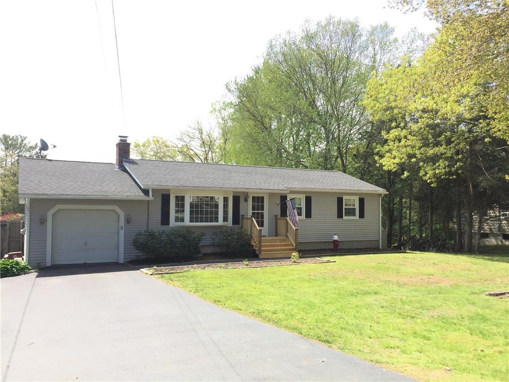 140 Roxbury Road East Lyme, CT 06357 - Photo 1 of 1 a house that has a yard