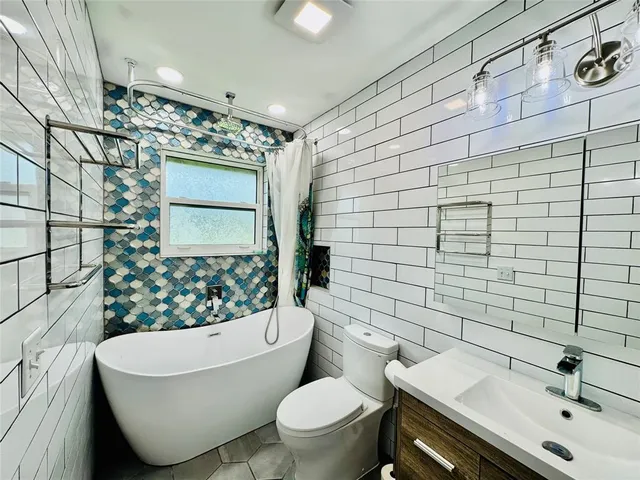 a view of a room with large windows