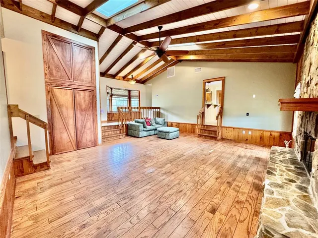 wooden floor and windows in an empty room with a window