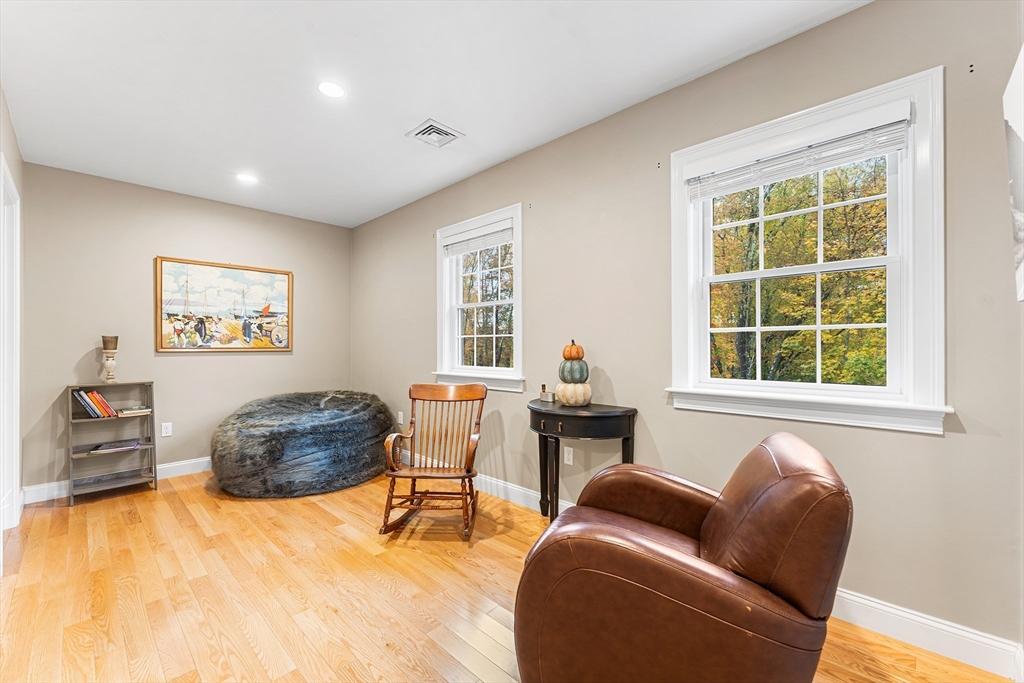 22 Washington Street Mendon, MA 01756 - Photo 18 of 31 a living room with furniture and a window