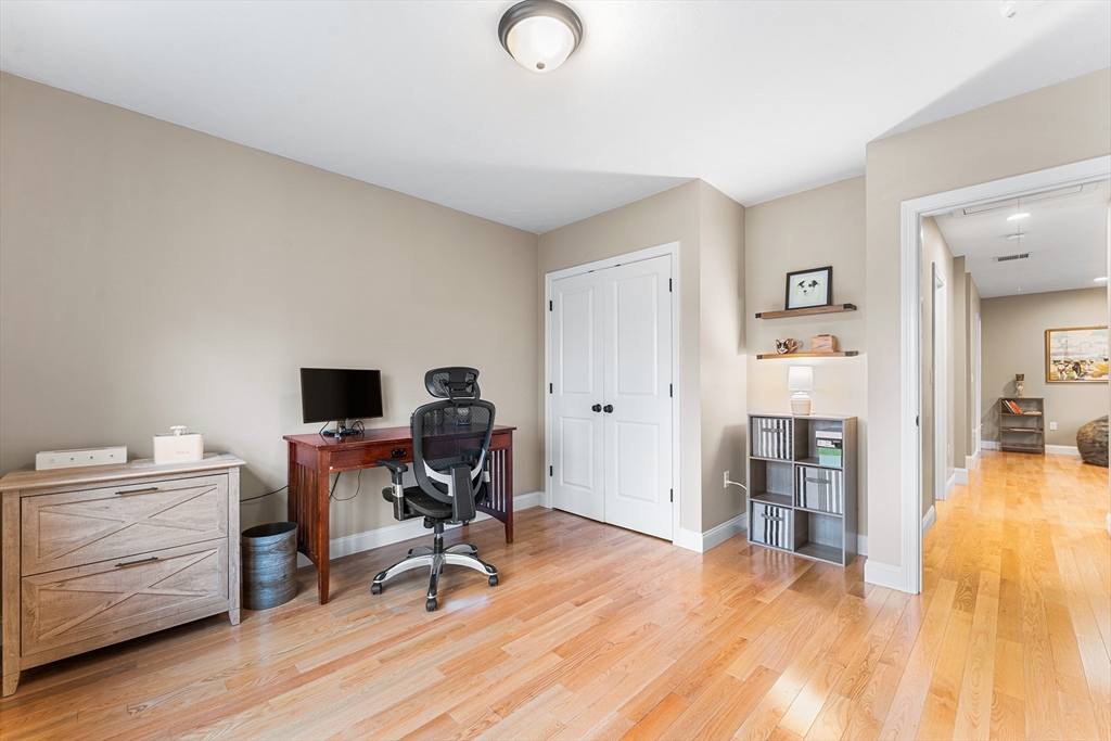 22 Washington Street Mendon, MA 01756 - Photo 23 of 31 a view of a workspace with furniture and wooden floor