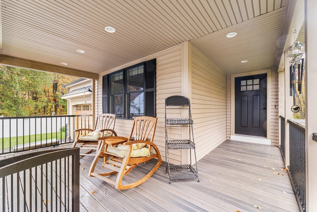 22 Washington Street Mendon, MA 01756 - Photo 3 of 31 a view of a chairs in balcony
