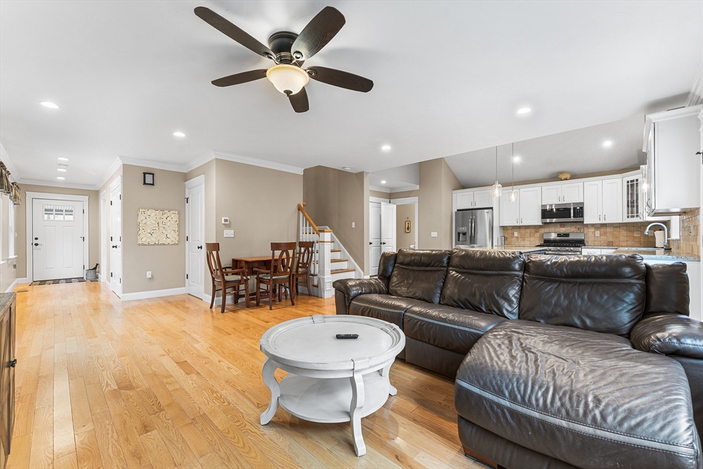 22 Washington Street Mendon, MA 01756 - Photo 5 of 31 a living room with furniture and a view of kitchen