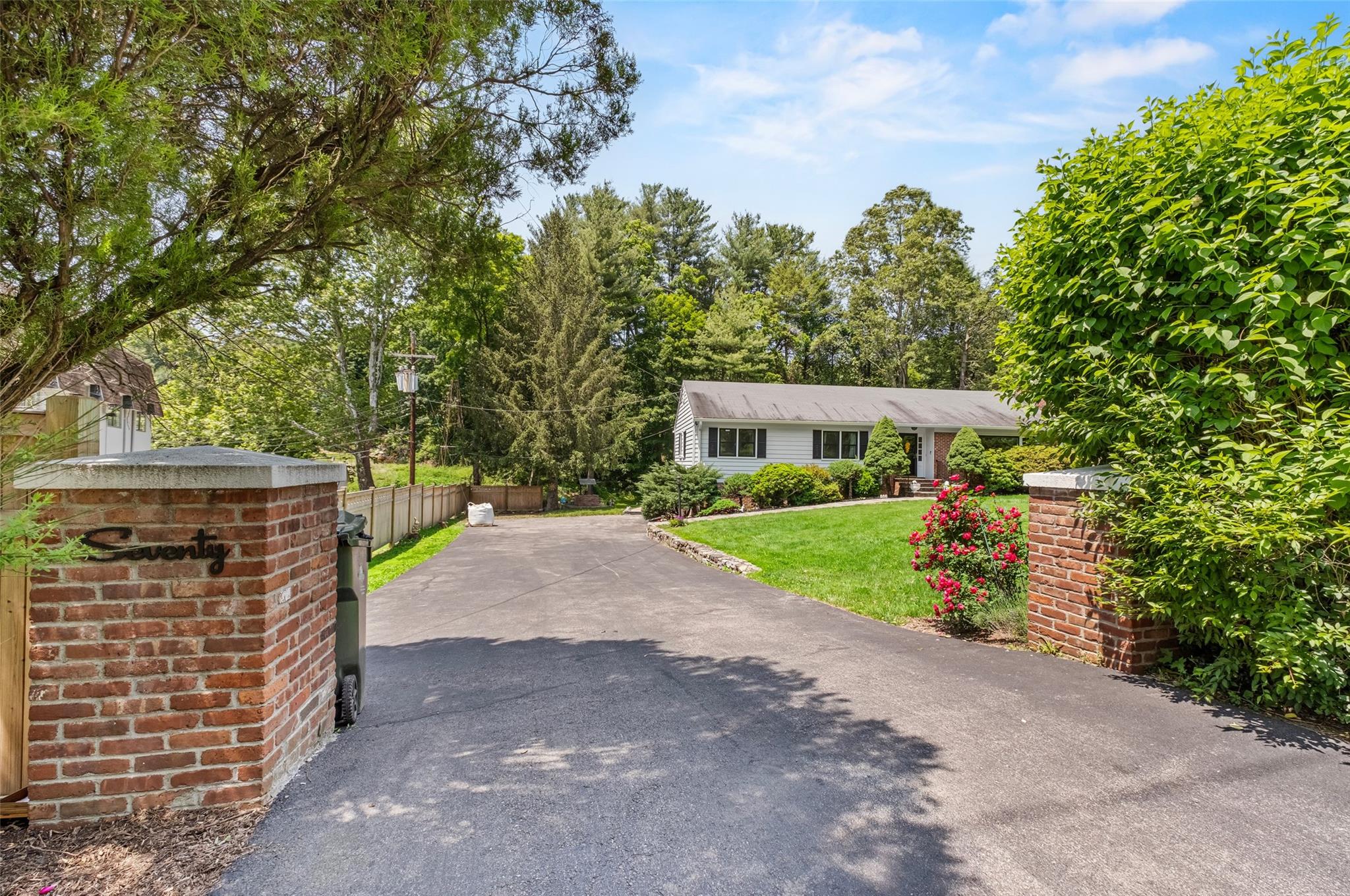 70 Goldens Bridge Road Katonah, NY 10536 - Photo 1 of 1 View of front facade with asphalt driveway