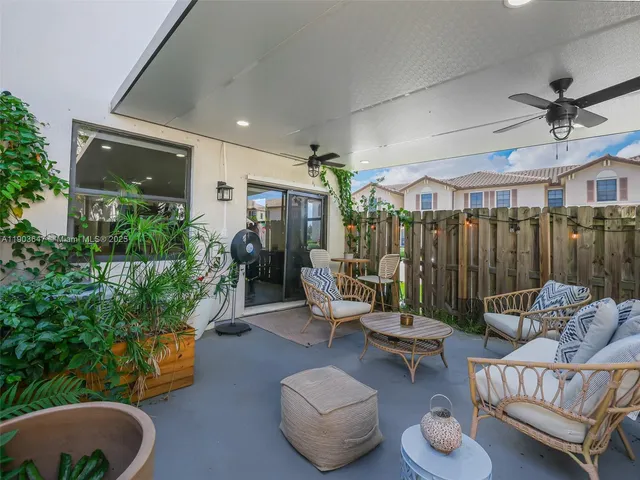 a outdoor living space with furniture and a couch
