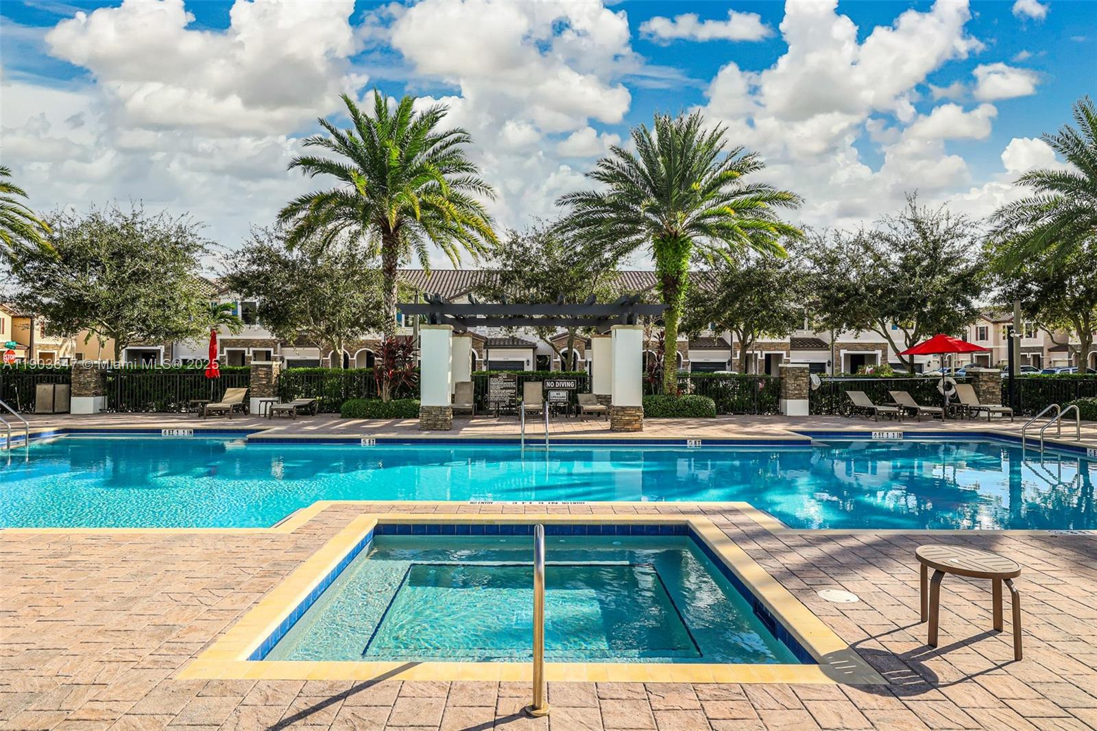 15097 Southwest 115th Street Miami, FL 33196 - Photo 35 of 44 a view of swimming pool with a garden and seating area