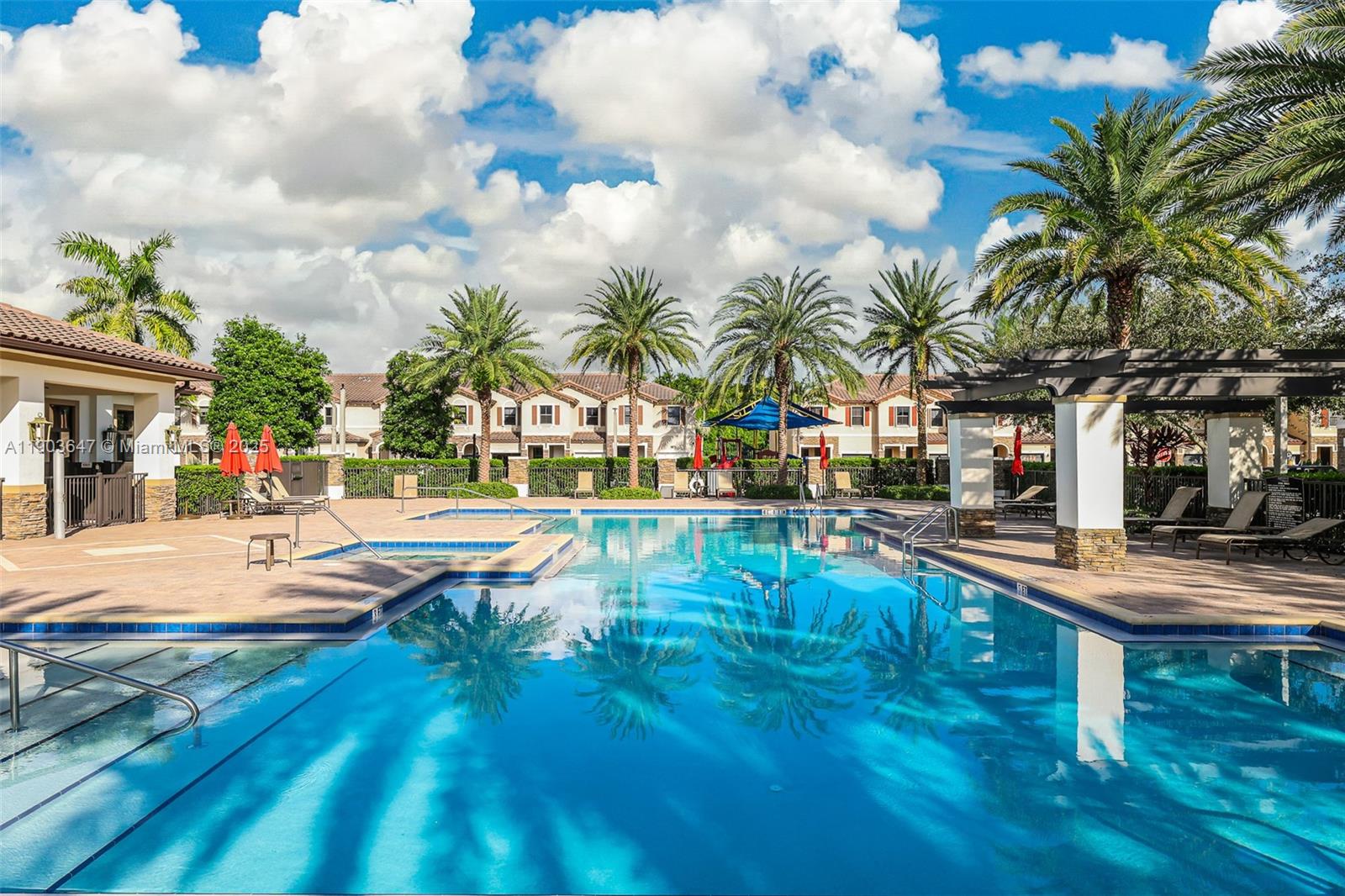 15097 Southwest 115th Street Miami, FL 33196 - Photo 36 of 44 a view of swimming pool with sitting area